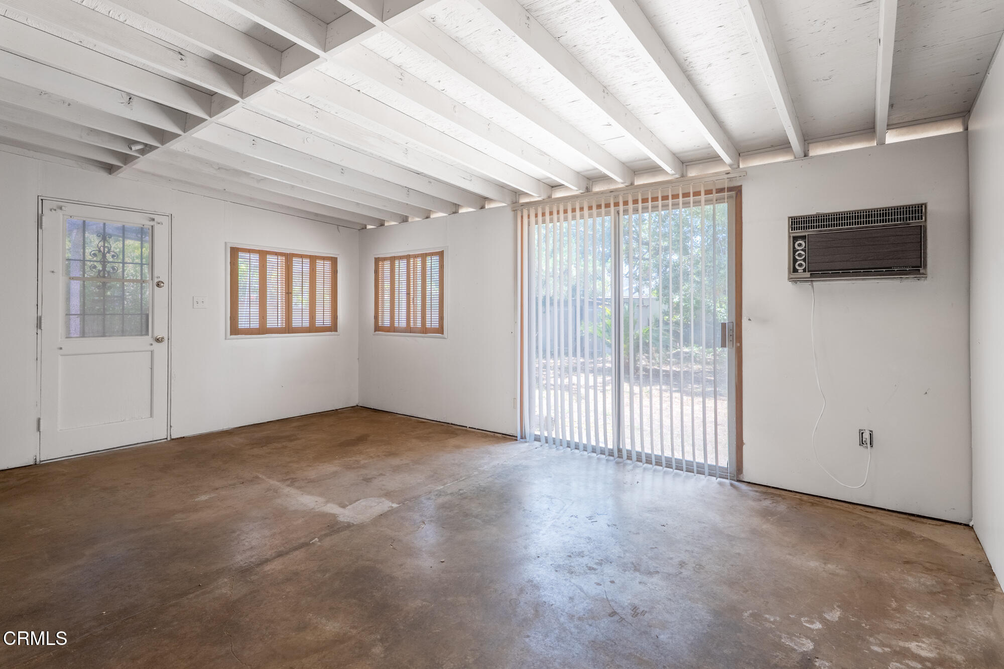 890 Arwin Street Pasadena, CA 91103 - Photo 21 of 40 a view of an empty room with a window