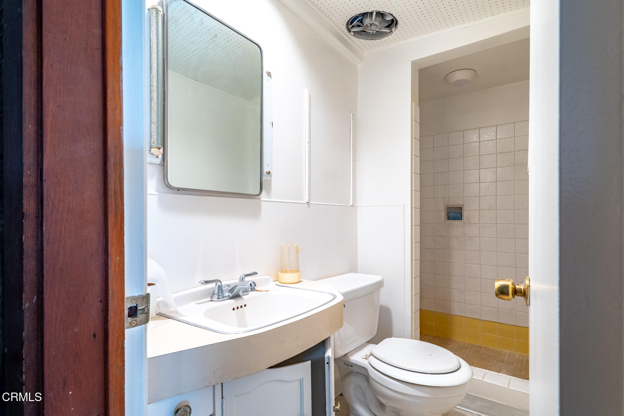 890 Arwin Street Pasadena, CA 91103 - Photo 25 of 40 a bathroom with a sink a toilet a mirror and shower