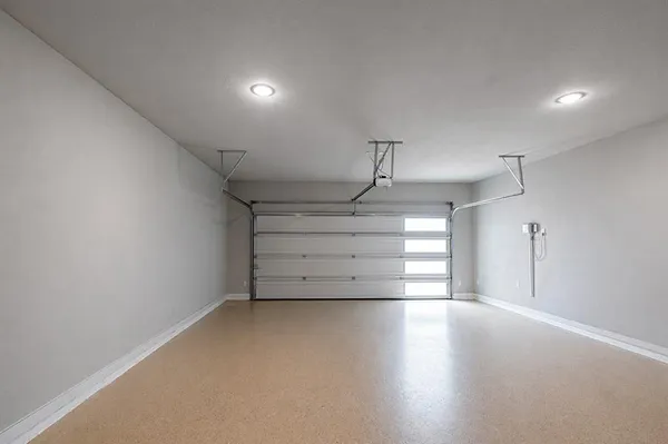 a view of a room with stairs and a wooden floors