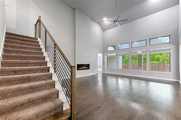 a view of an entryway with wooden floor