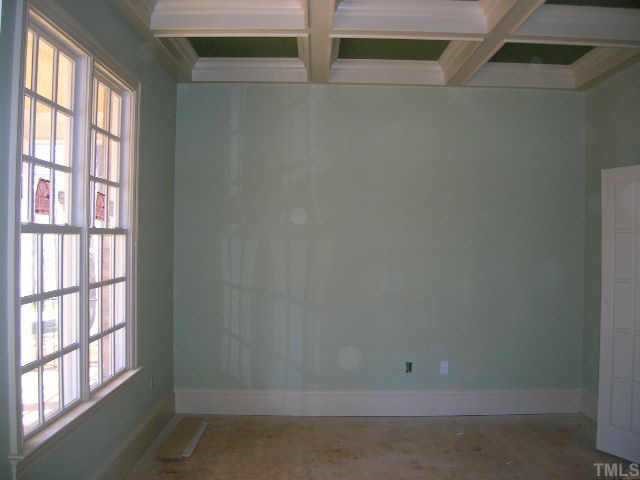 1812 Silver Mist Court Raleigh, NC 27613 - Photo 3 of 10 a room that has a window in it