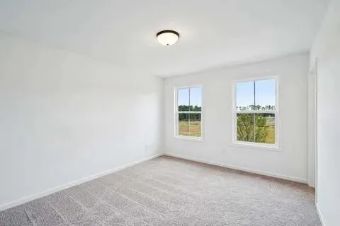 a view of entryway with a table and chairs