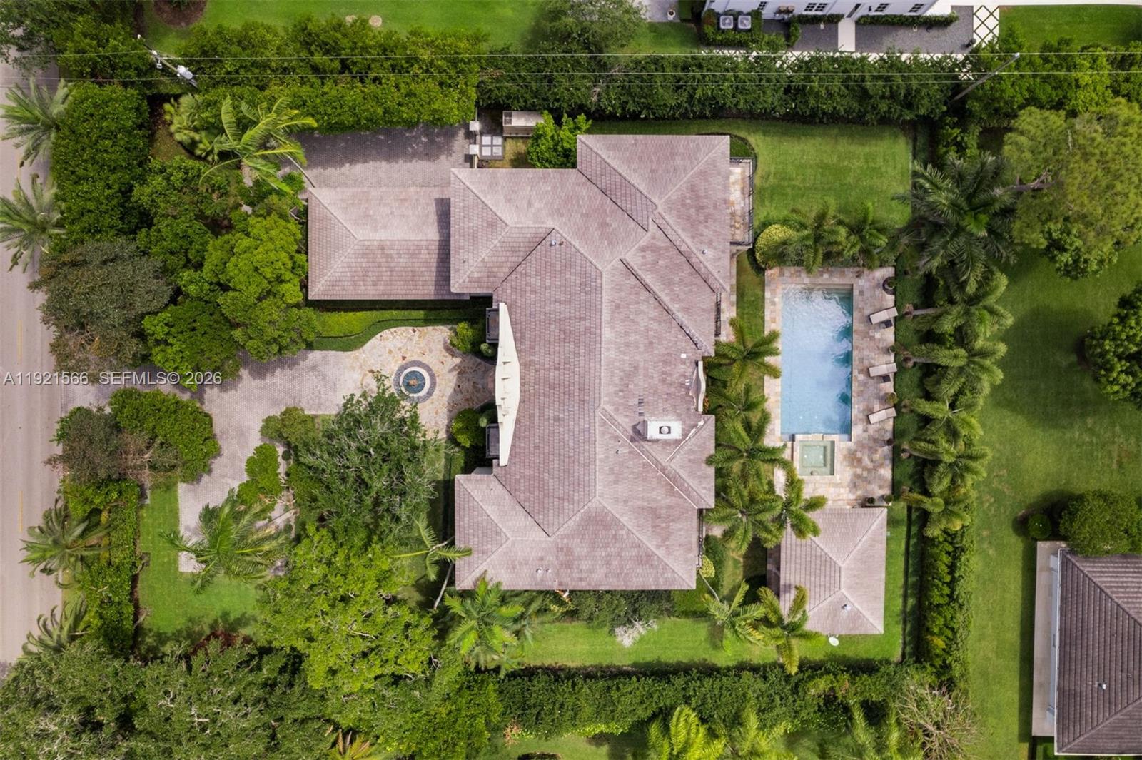 8010 Ponce De Leon Road Miami, FL 33143 - Photo 30 of 31 an aerial view of a house with a garden and lake view
