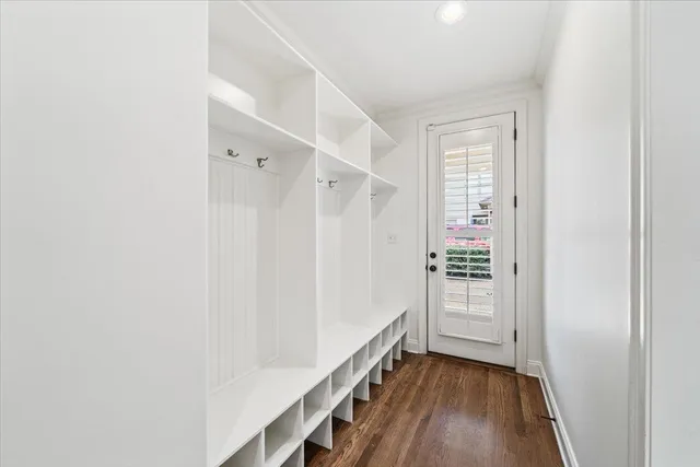 a view of an entryway with wooden floor
