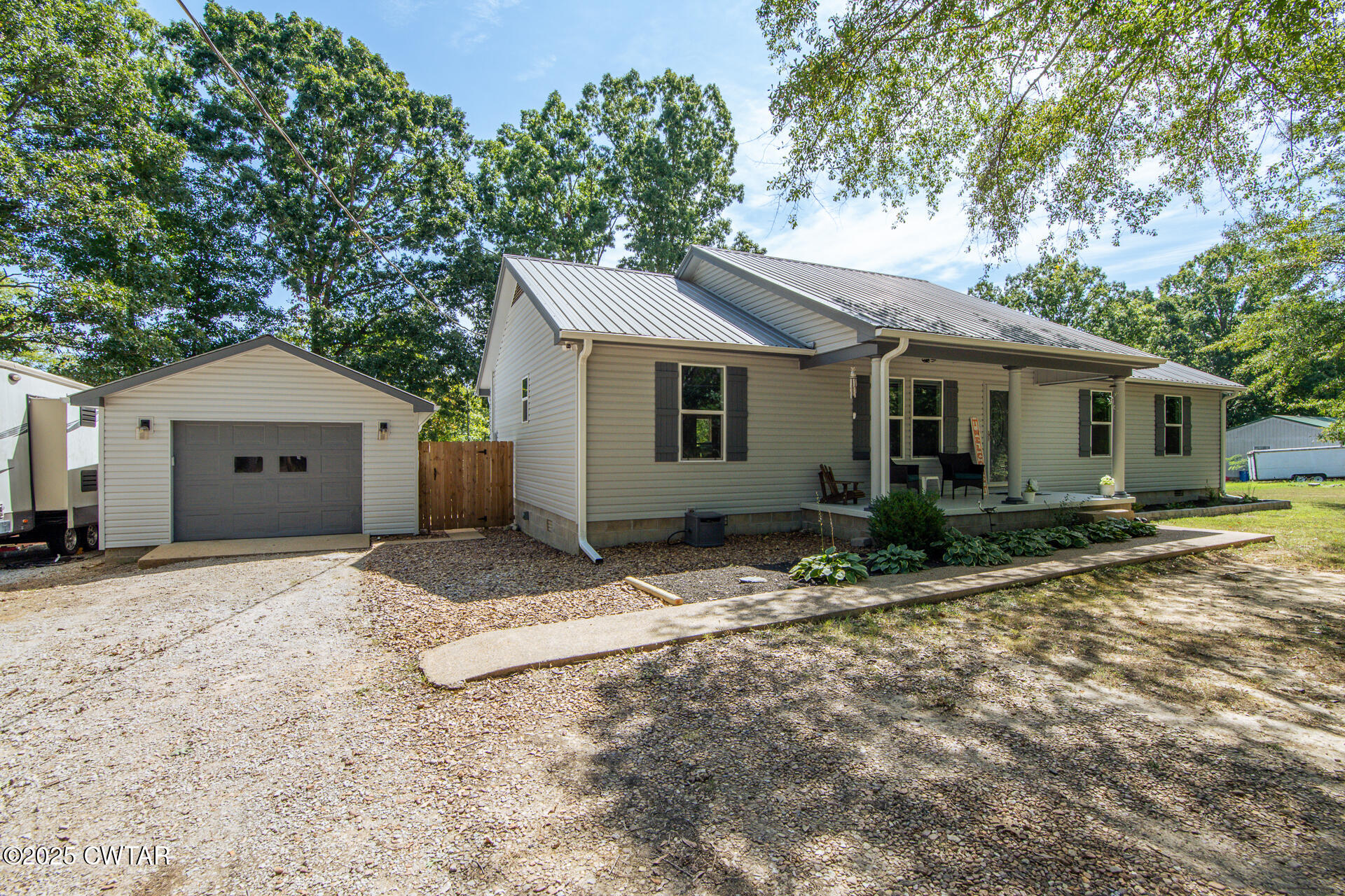 1000 Verles King Road Medon, TN 38356 - Photo 2 of 34 a view of a house with a yard