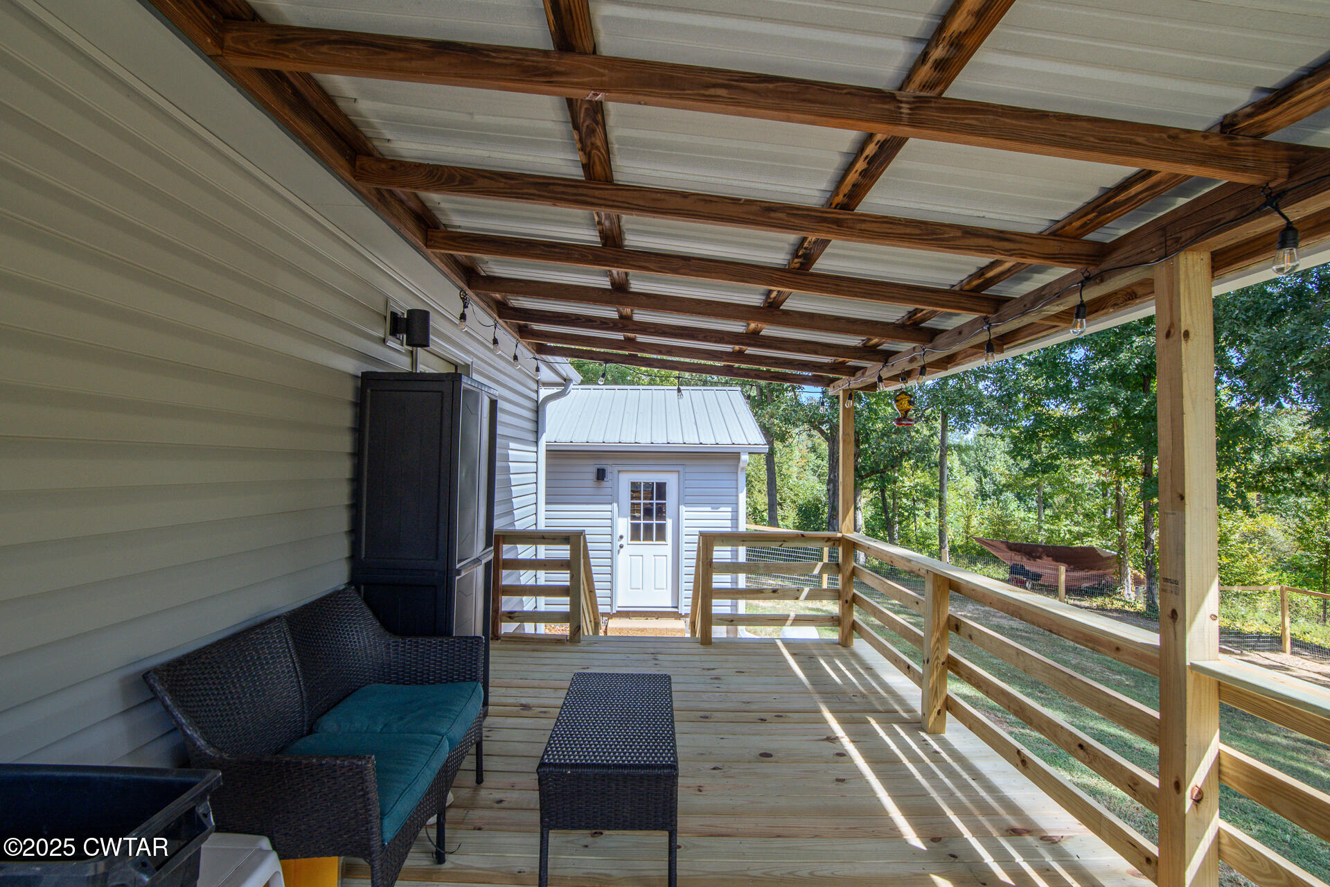 1000 Verles King Road Medon, TN 38356 - Photo 24 of 34 a view of a porch with furniture and a yard