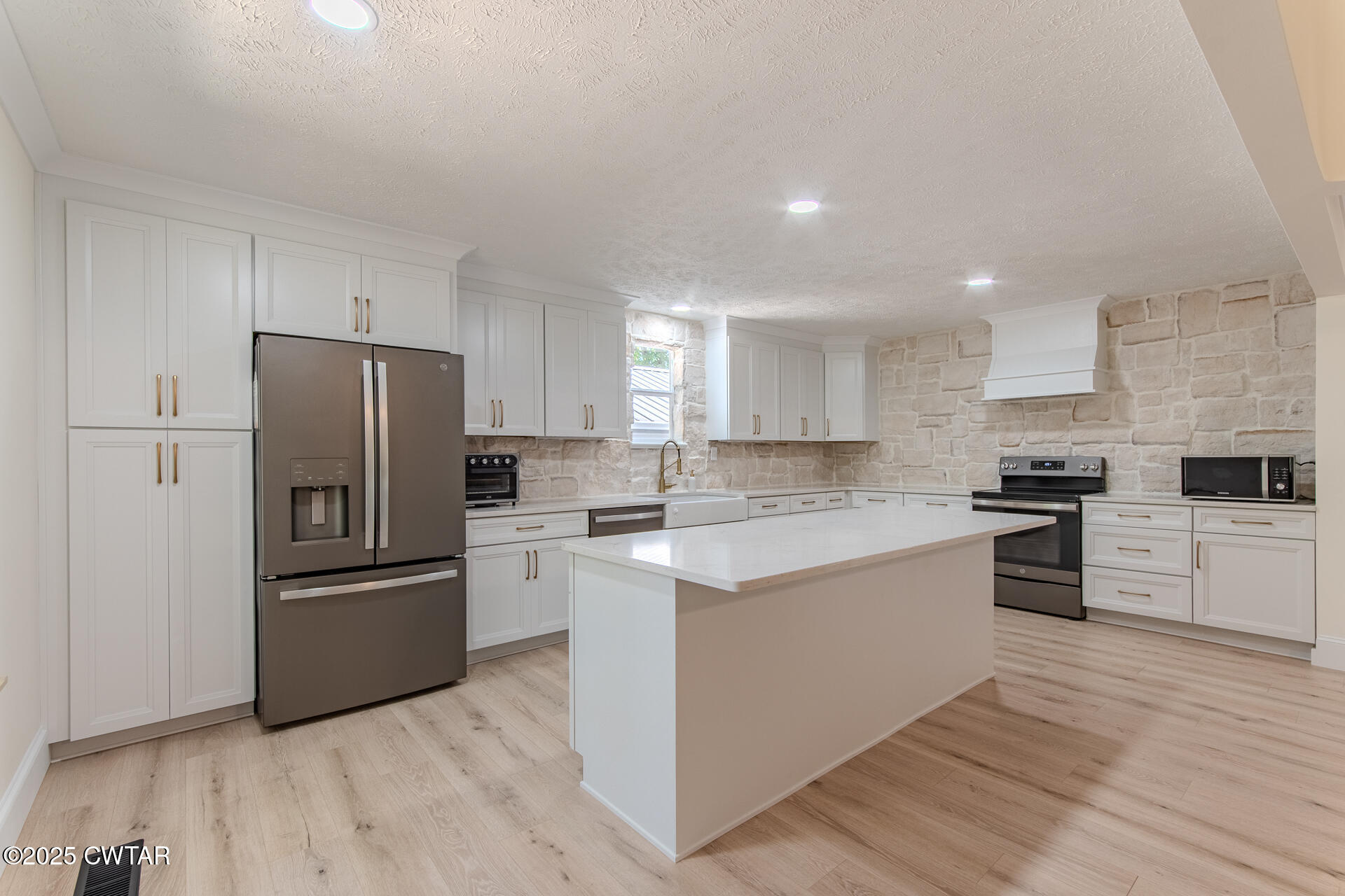 1000 Verles King Road Medon, TN 38356 - Photo 7 of 34 a kitchen with a refrigerator stove top oven and cabinets