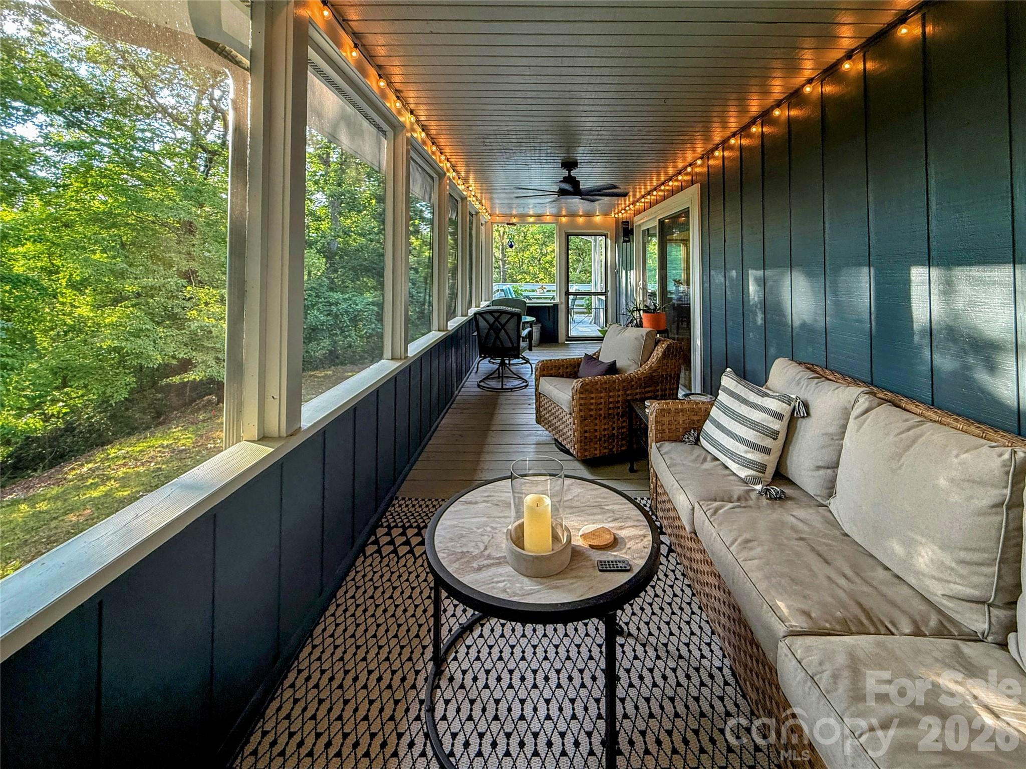 550 South River Road Tryon, NC 28782 - Photo 27 of 47 a view of balcony with couch and chairs