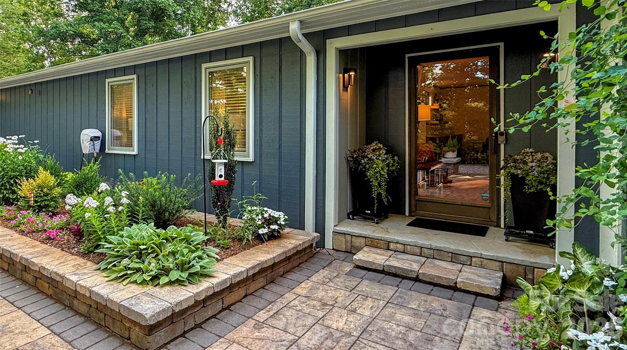 550 South River Road Tryon, NC 28782 - Photo 3 of 47 a front view of a house having yard