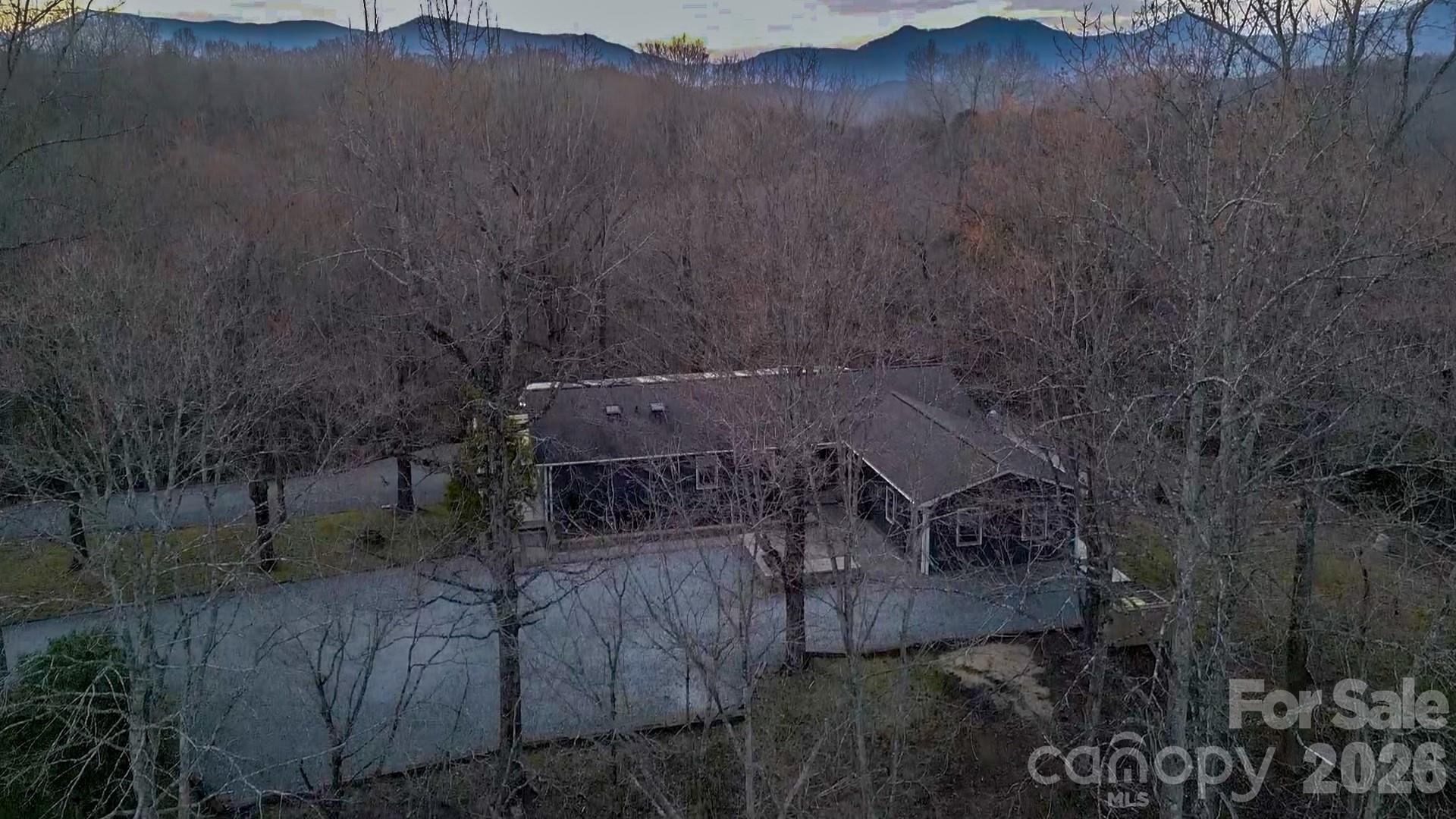 550 South River Road Tryon, NC 28782 - Photo 47 of 47 a aerial view of a house with a yard