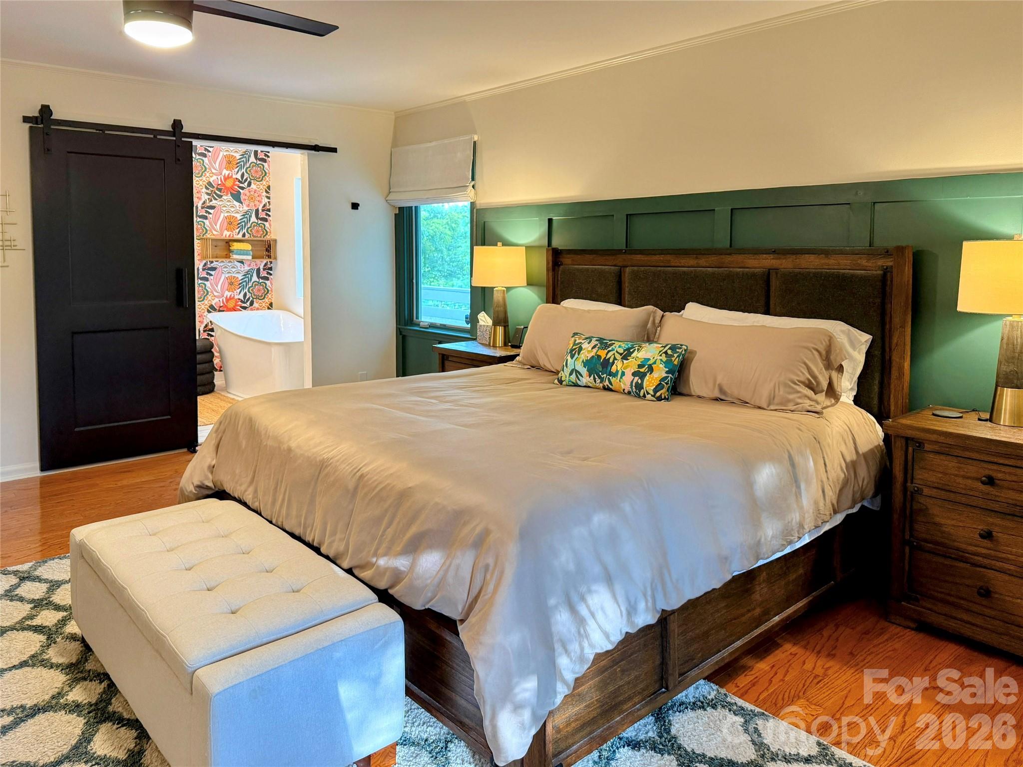 550 South River Road Tryon, NC 28782 - Photo 7 of 47 a bedroom with a bed and a night stand