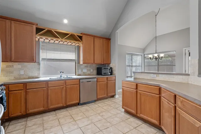 a large kitchen with cabinets