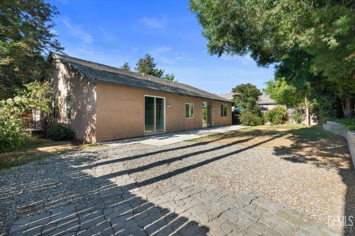 Undisclosed Address Bakersfield, CA 93312 - Photo 39 of 45 a view of a house with a yard