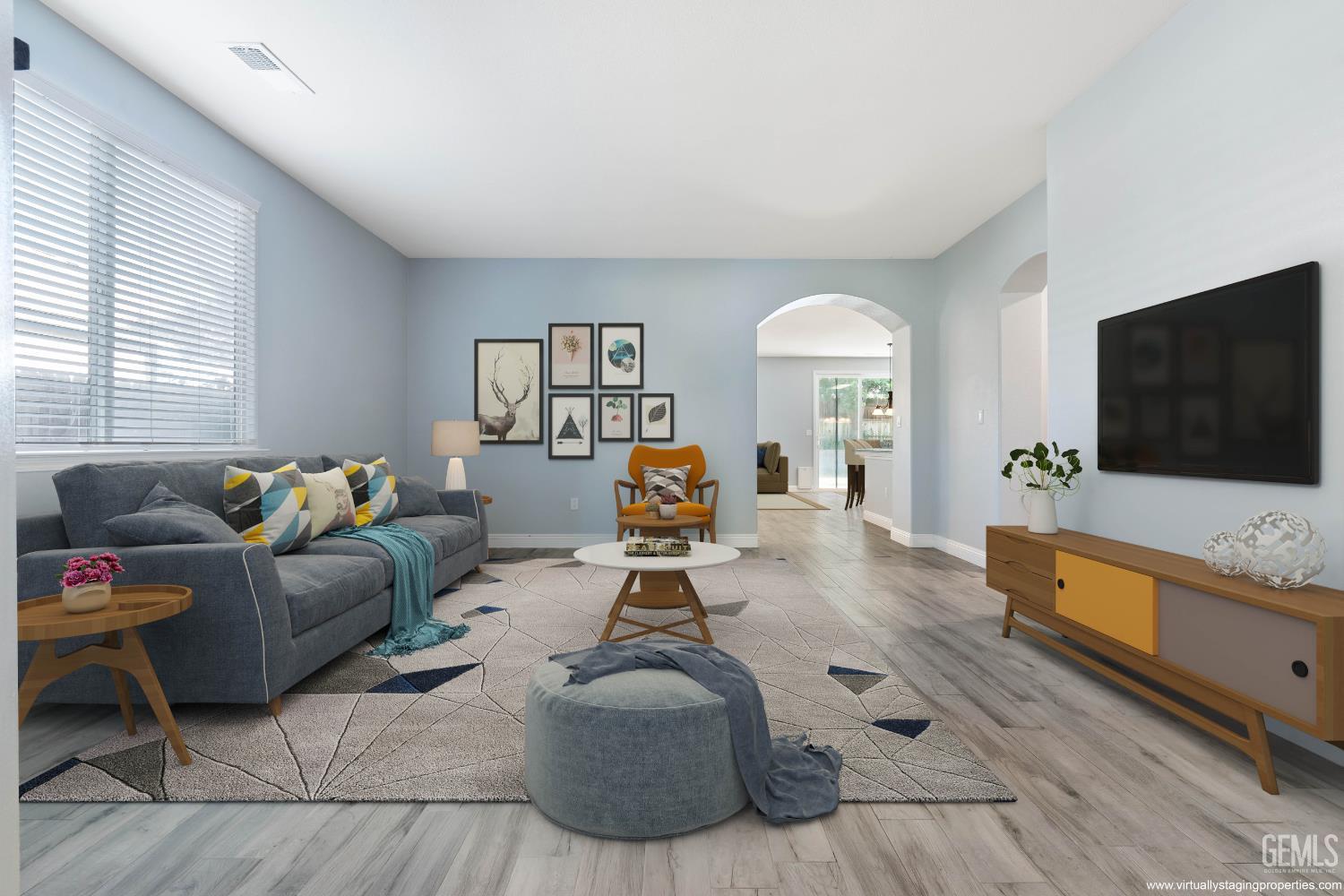 Undisclosed Address Bakersfield, CA 93312 - Photo 4 of 45 a living room with furniture and a flat screen tv