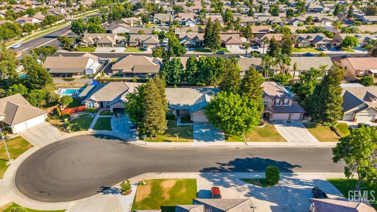 Undisclosed Address Bakersfield, CA 93312 - Photo 43 of 45 an aerial view of a house with a swimming pool