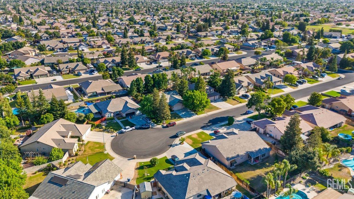Undisclosed Address Bakersfield, CA 93312 - Photo 44 of 45 an aerial view of a house with a swimming pool