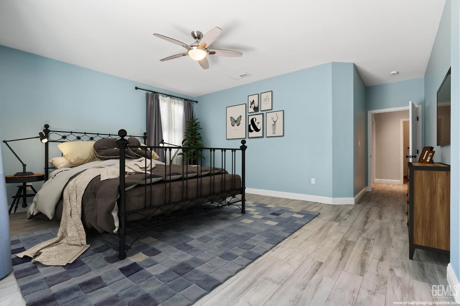 Undisclosed Address Bakersfield, CA 93312 - Photo 5 of 45 a bedroom with a bed and a chandelier