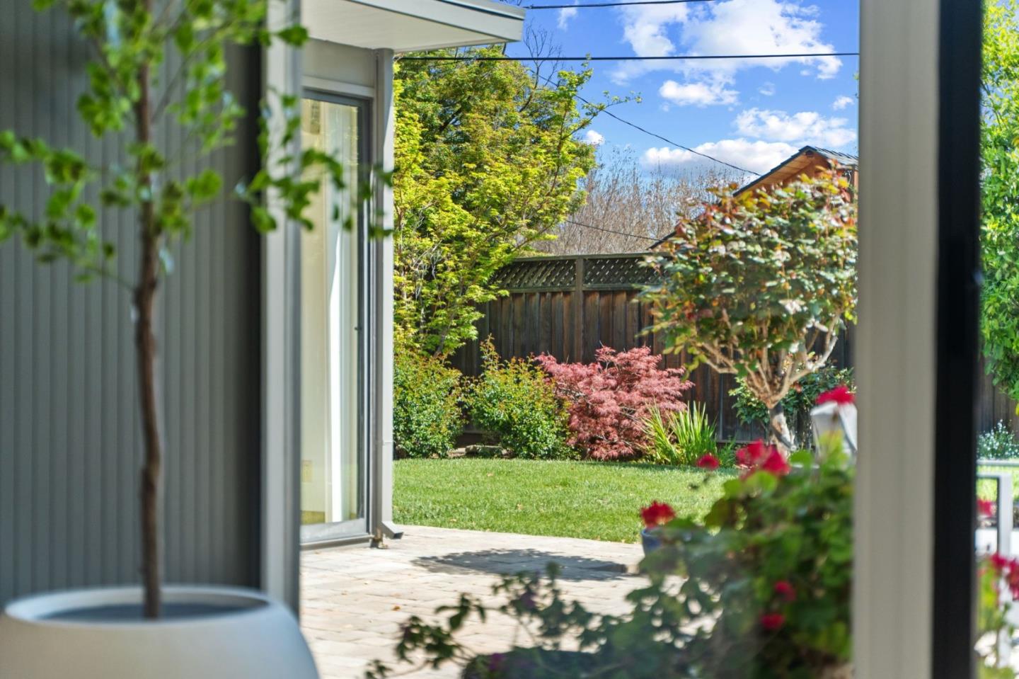 2018 Adele Place San Jose, CA 95125 - Photo 11 of 46 a view of a flower in a yard with a fountain