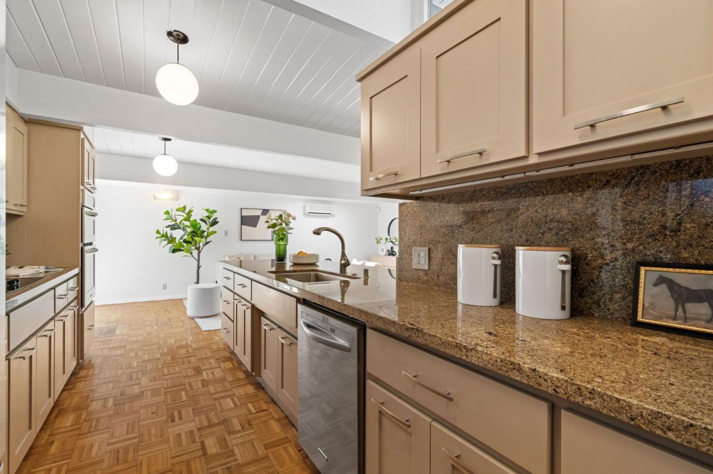 2018 Adele Place San Jose, CA 95125 - Photo 26 of 46 a kitchen with granite countertop a sink and white cabinets