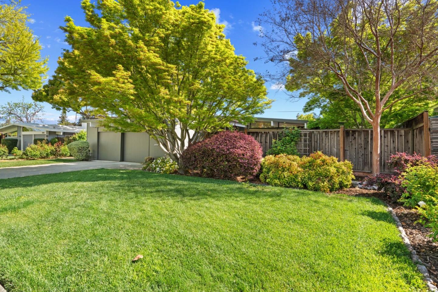 2018 Adele Place San Jose, CA 95125 - Photo 3 of 46 a view of a garden with a fountain
