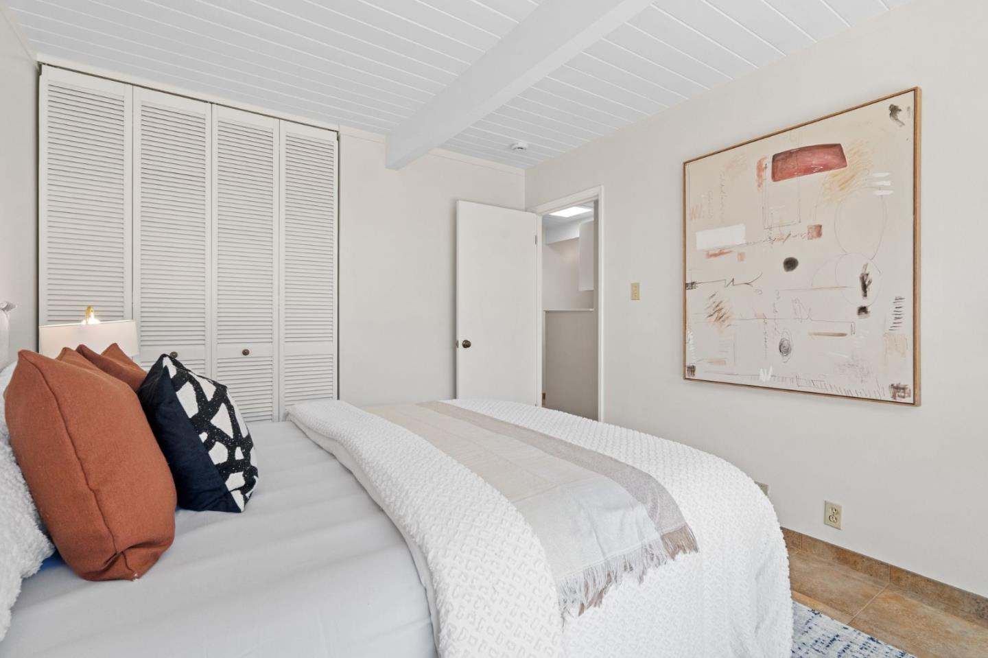 2018 Adele Place San Jose, CA 95125 - Photo 35 of 46 a bedroom with a bed and a painting on the wall