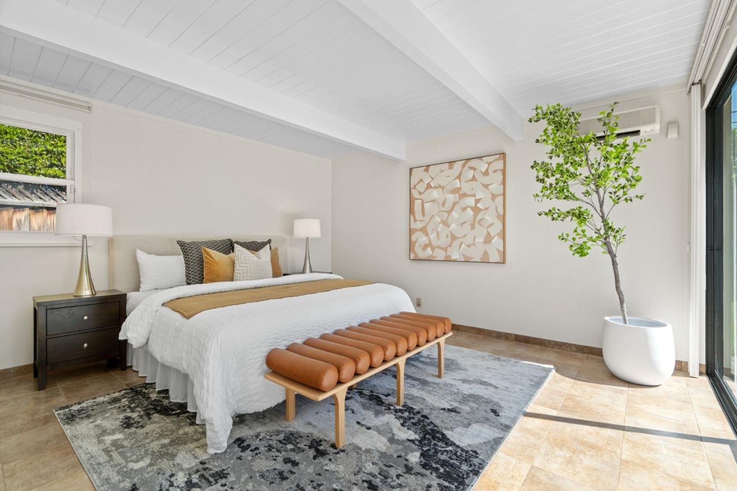 2018 Adele Place San Jose, CA 95125 - Photo 36 of 46 a bedroom with a bed and a potted plant