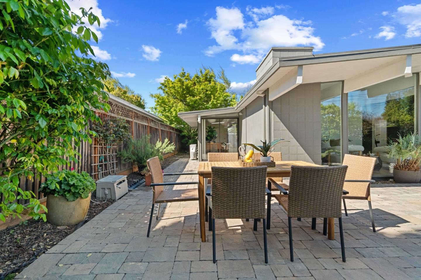 2018 Adele Place San Jose, CA 95125 - Photo 42 of 46 a view of a patio with table and chairs with plants and garden