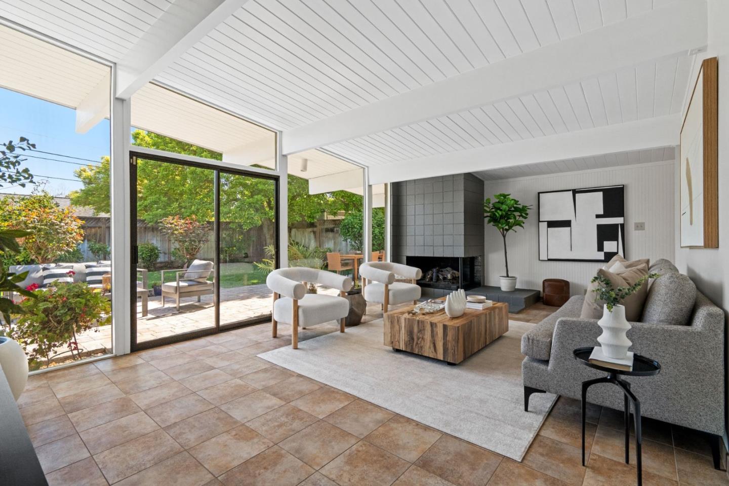 2018 Adele Place San Jose, CA 95125 - Photo 6 of 46 a living room with fireplace furniture and a large window