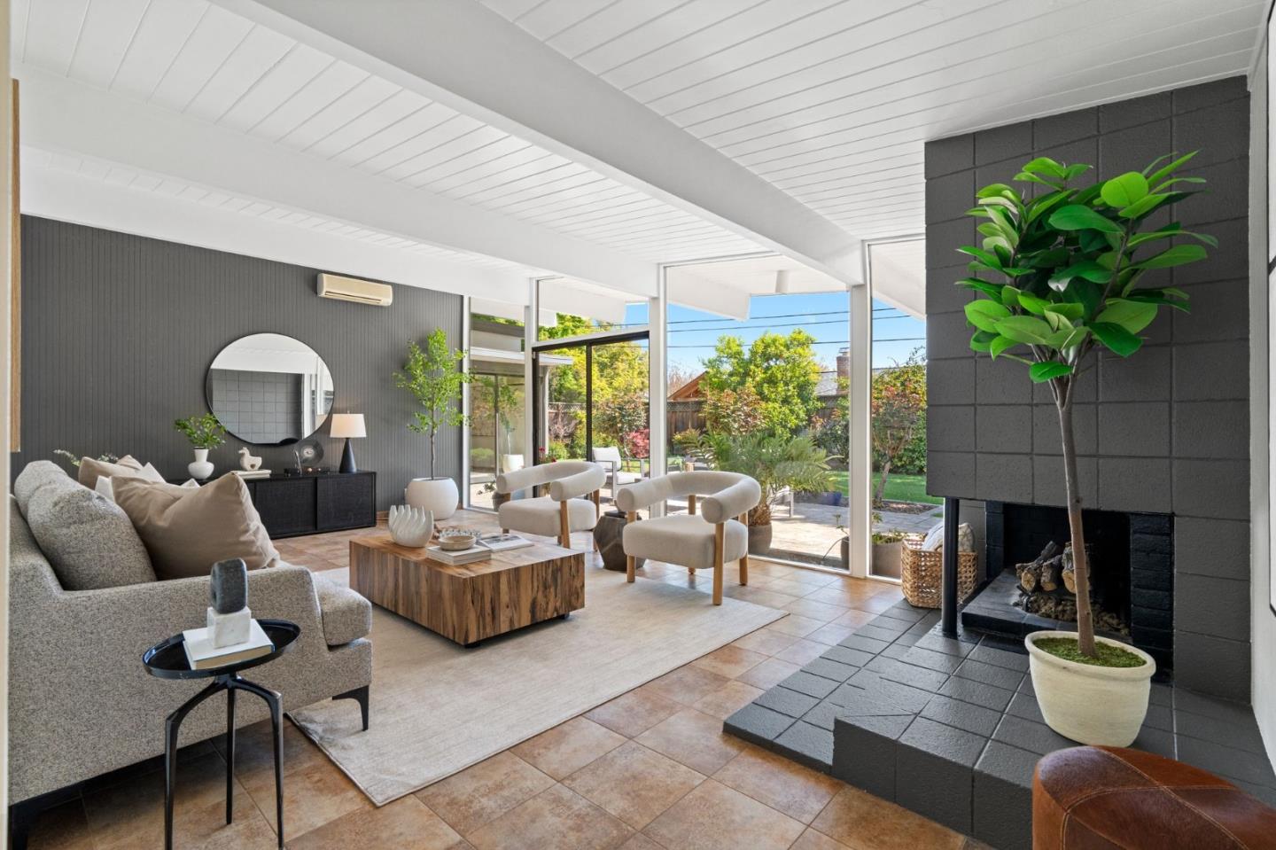2018 Adele Place San Jose, CA 95125 - Photo 10 of 46 a living room with furniture potted plant and a large window