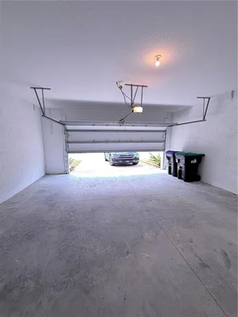 a view of empty room with fireplace