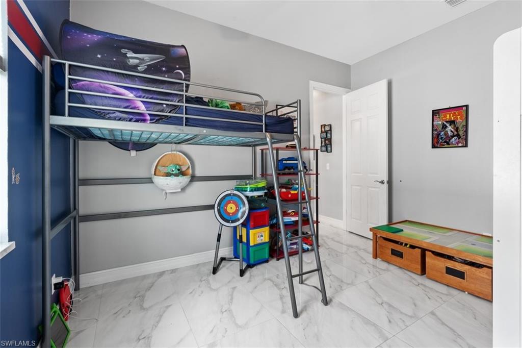 3611 8th Street Southwest Lehigh Acres, FL 33976 - Photo 13 of 21 a view of storage and utility room