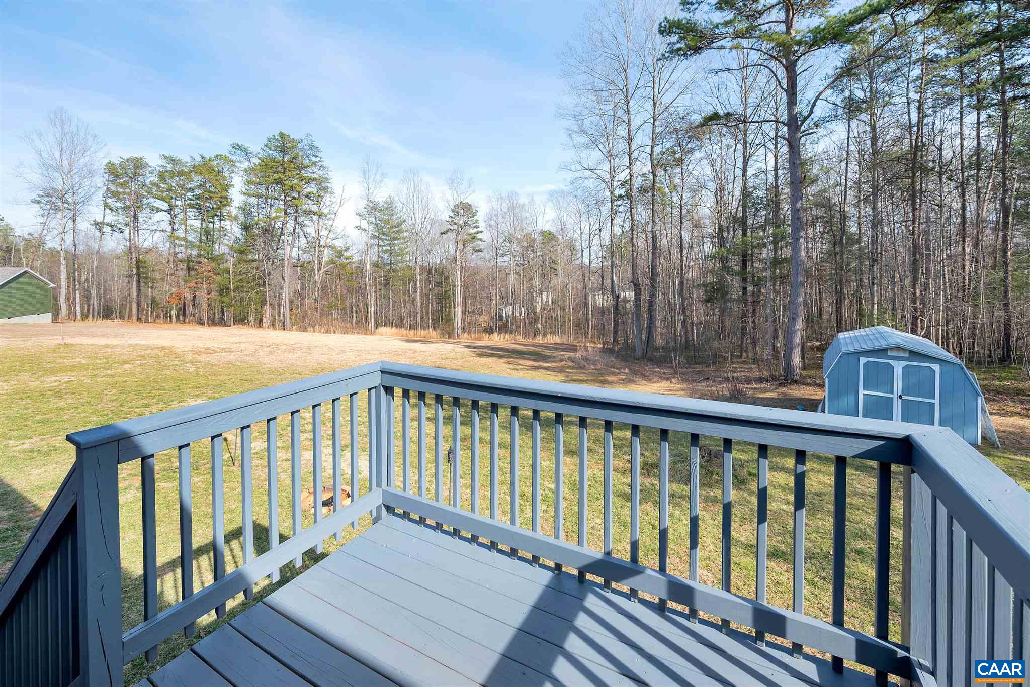 4491 Amicus Road Ruckersville, VA 22968 - Photo 25 of 37 a balcony with view of trees in the background