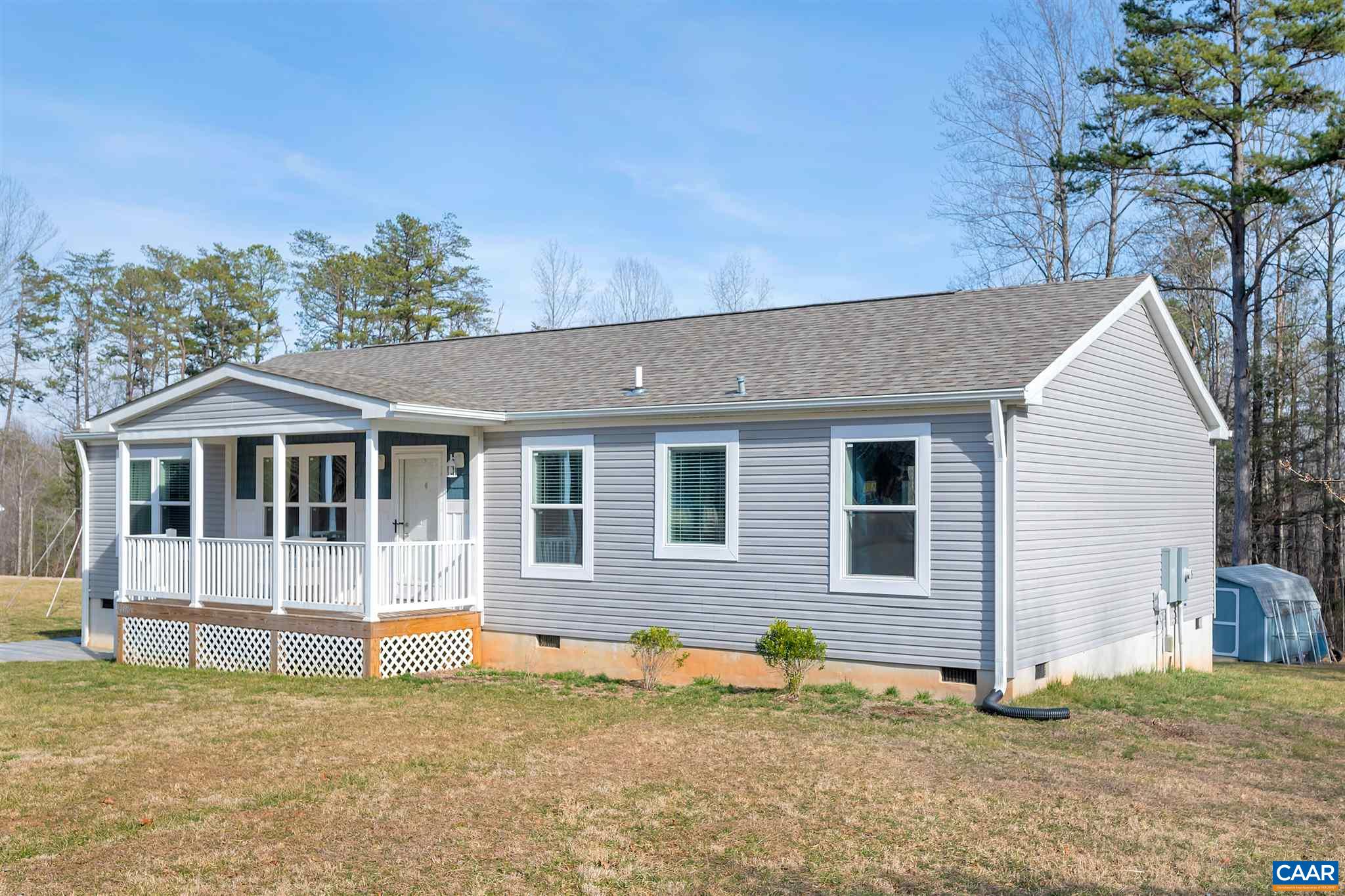 4491 Amicus Road Ruckersville, VA 22968 - Photo 30 of 37 a front view of a house with a yard