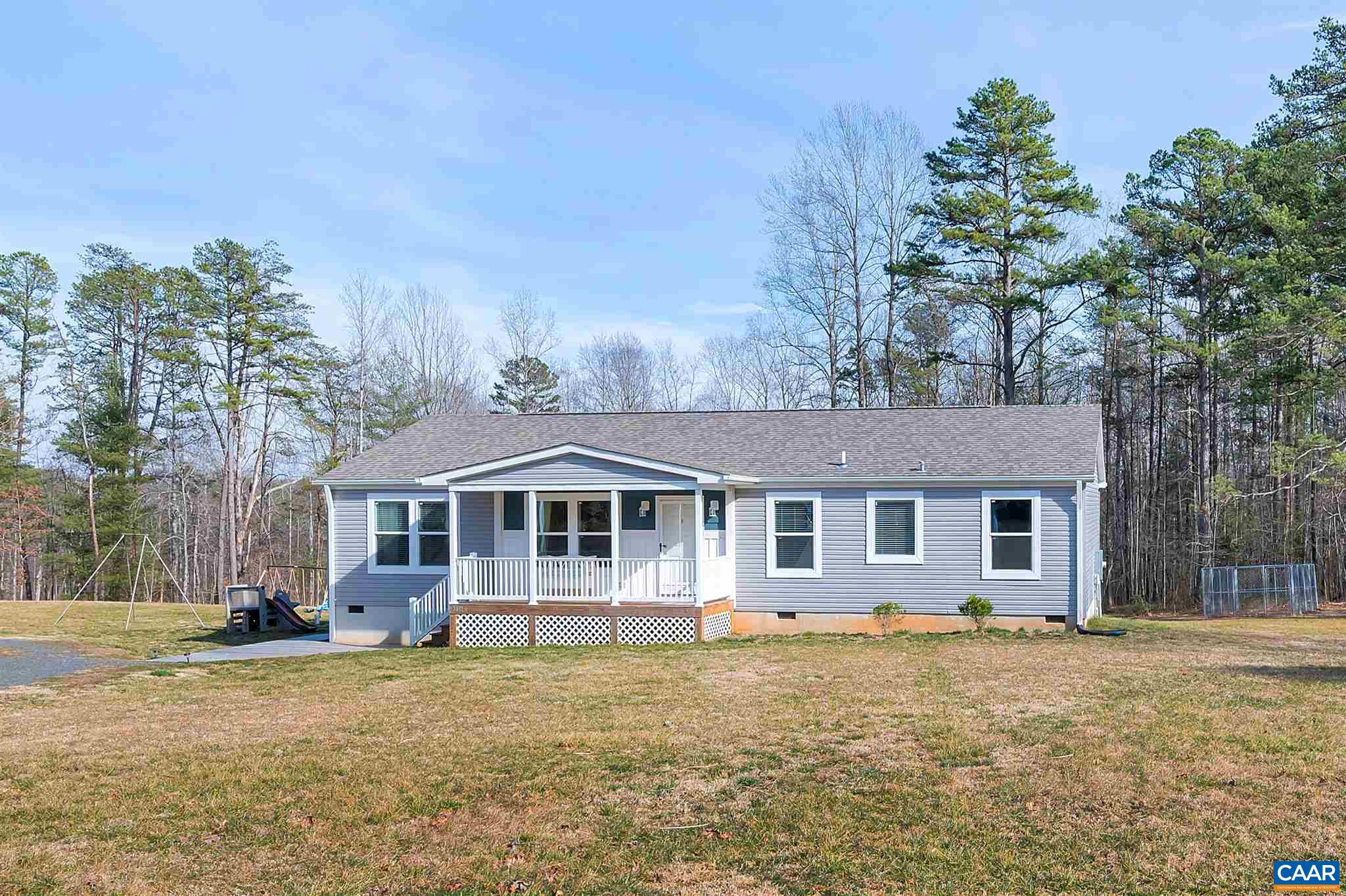 4491 Amicus Road Ruckersville, VA 22968 - Photo 34 of 37 a front view of a house with a garden
