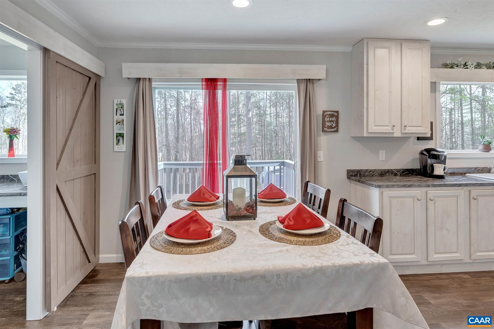 4491 Amicus Road Ruckersville, VA 22968 - Photo 10 of 37 a dining room with furniture and window