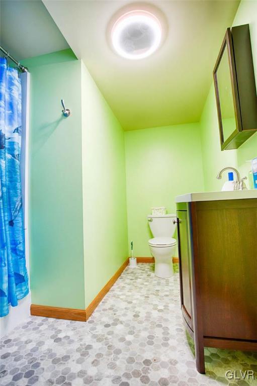 1239 Bushkill Center Road Nazareth, PA 18064 - Photo 11 of 14 a bathroom with a sink and a toilet