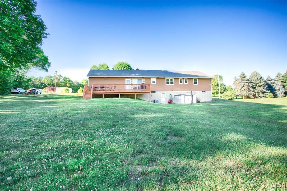 1239 Bushkill Center Road Nazareth, PA 18064 - Photo 14 of 14 a view of a house with a big yard