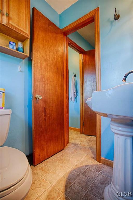 1239 Bushkill Center Road Nazareth, PA 18064 - Photo 8 of 14 a bathroom with a sink a toilet and shower