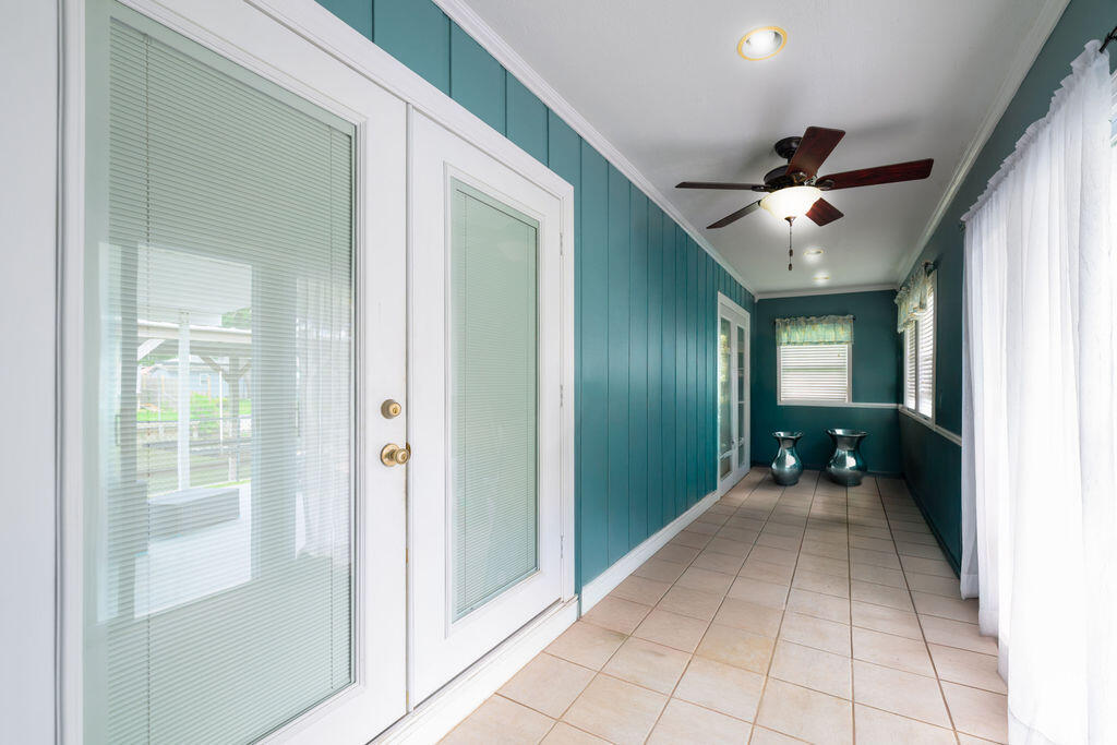 1044 4th Street Okeechobee, FL 34974 - Photo 38 of 39 a view of a hallway with interior of the house