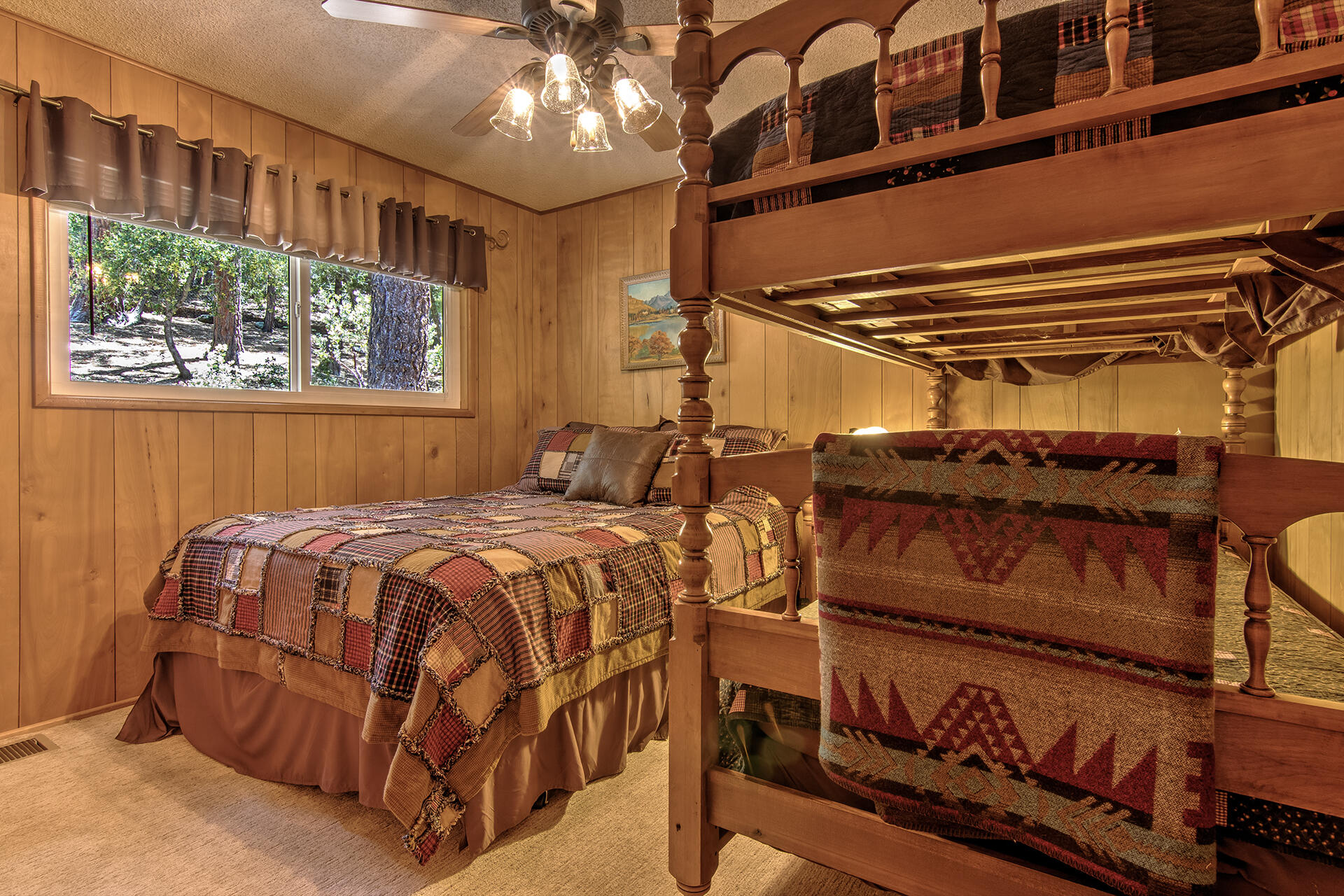 25770 Scenic Drive Idyllwild, CA 92549 - Photo 36 of 51 a bedroom with a bed and window