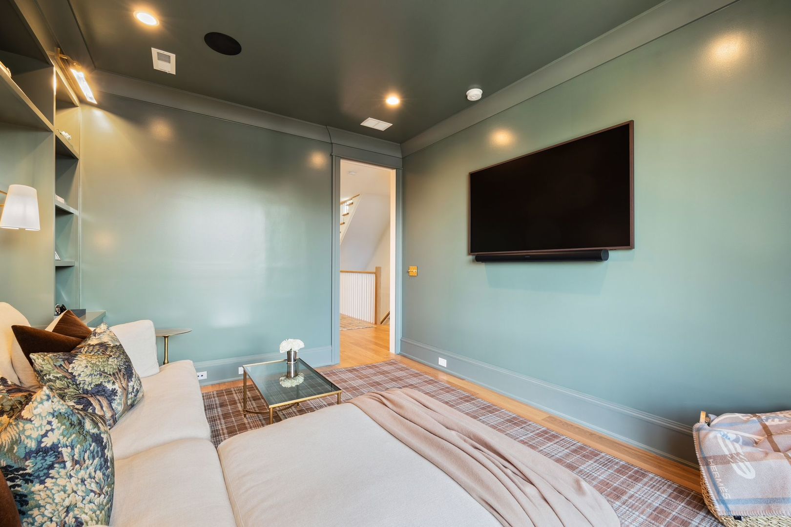 2034 North Mohawk Street, Unit 3 Chicago, IL 60614 - Photo 20 of 46 a bedroom with a bed and a flat screen tv