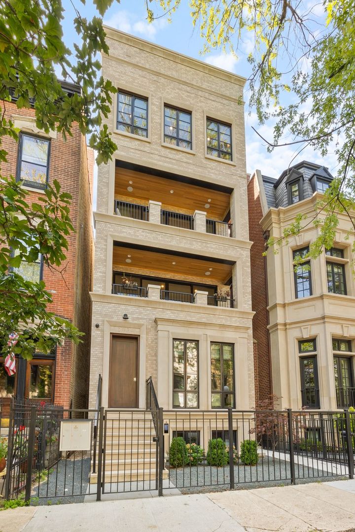 2034 North Mohawk Street, Unit 3 Chicago, IL 60614 - Photo 2 of 46 a view of a brick building next to a yard