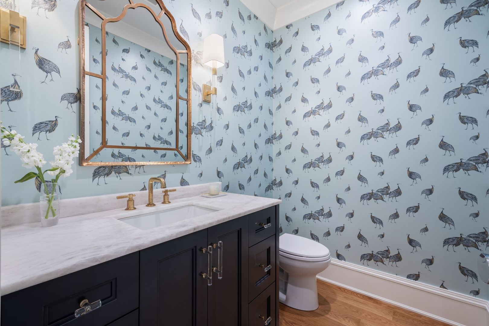 2034 North Mohawk Street, Unit 3 Chicago, IL 60614 - Photo 21 of 46 a bathroom with a granite countertop sink a toilet and a mirror