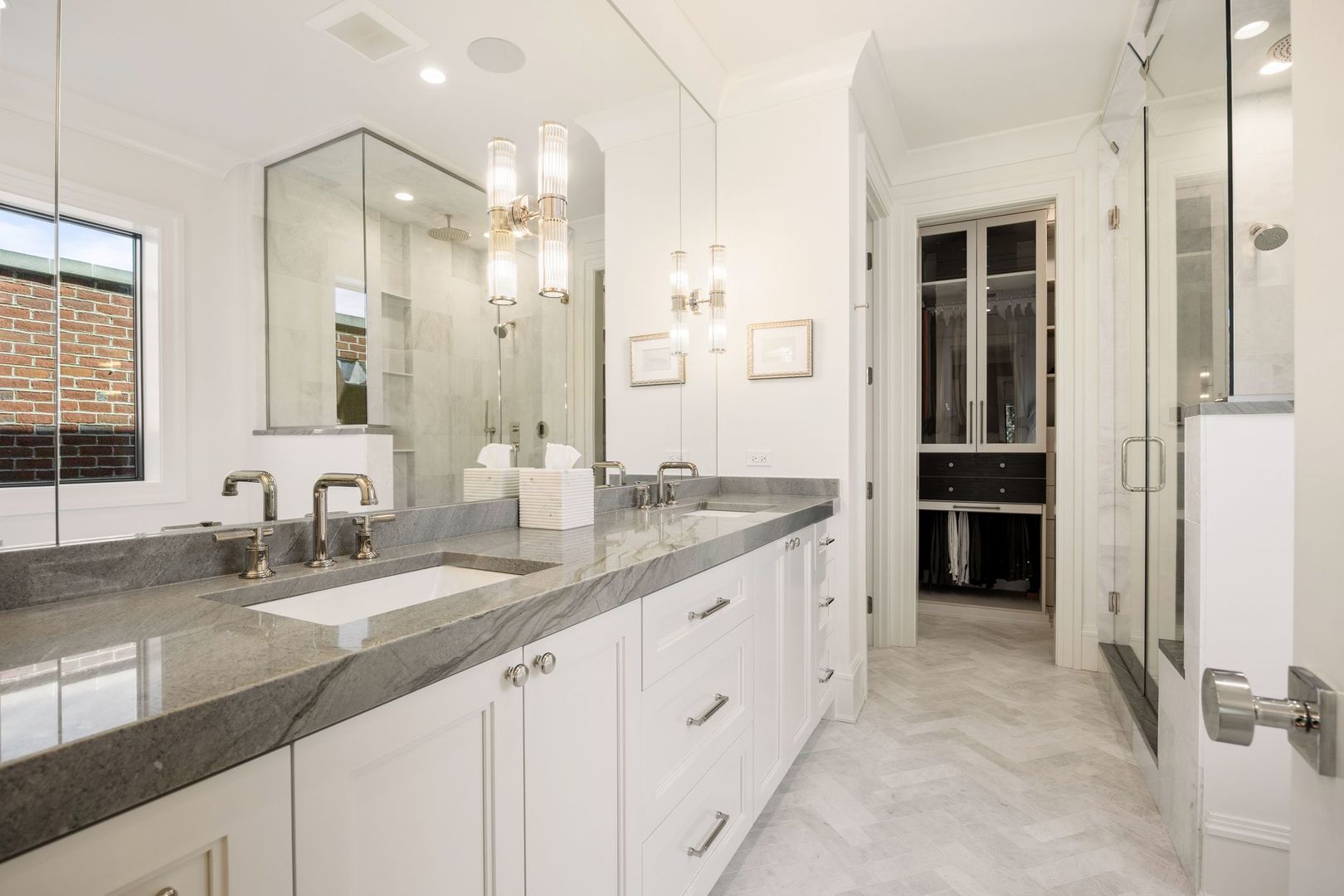 2034 North Mohawk Street, Unit 3 Chicago, IL 60614 - Photo 26 of 46 a bathroom with a granite countertop sink and a mirror