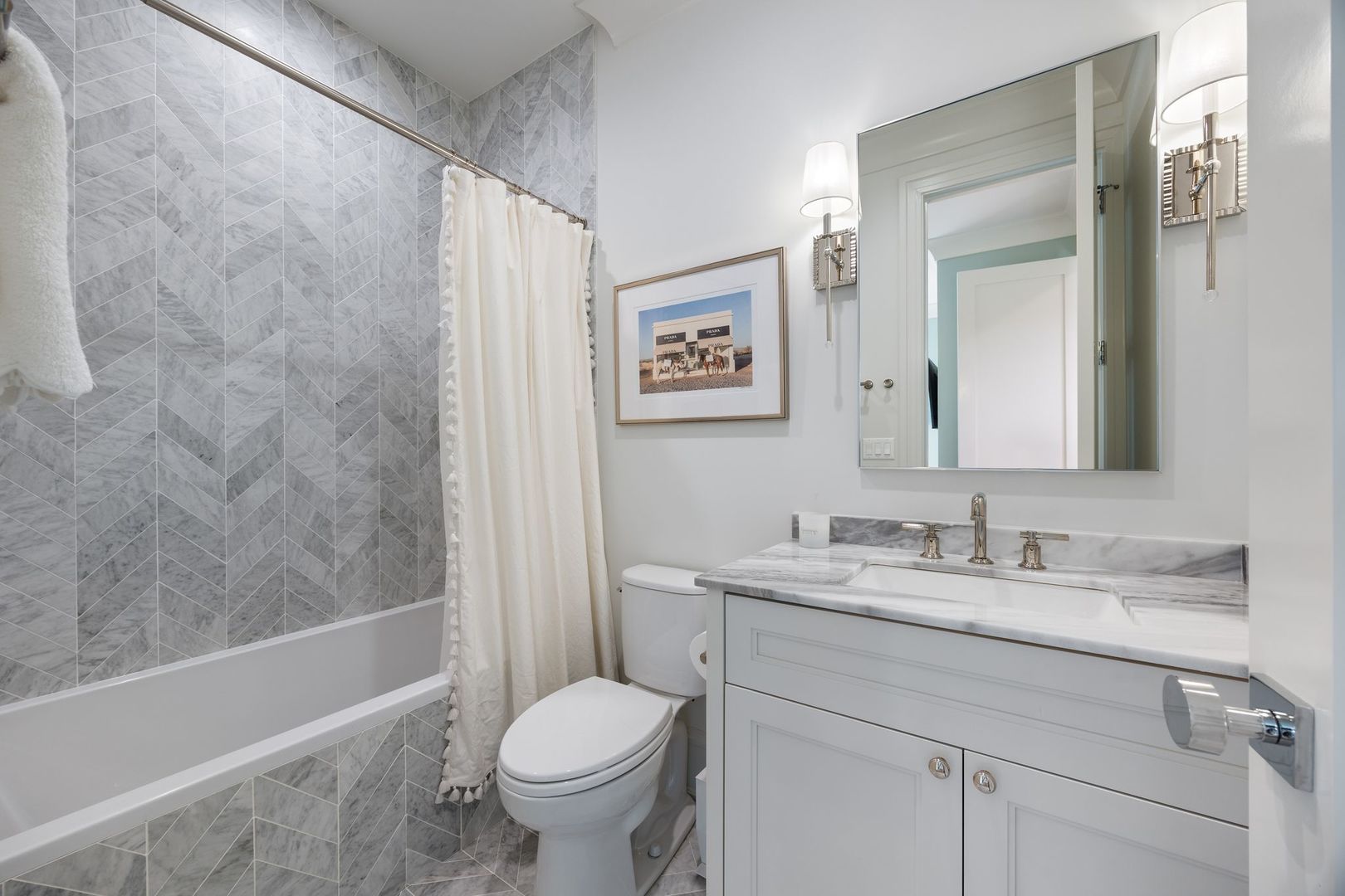 2034 North Mohawk Street, Unit 3 Chicago, IL 60614 - Photo 37 of 46 a bathroom with a sink toilet and shower