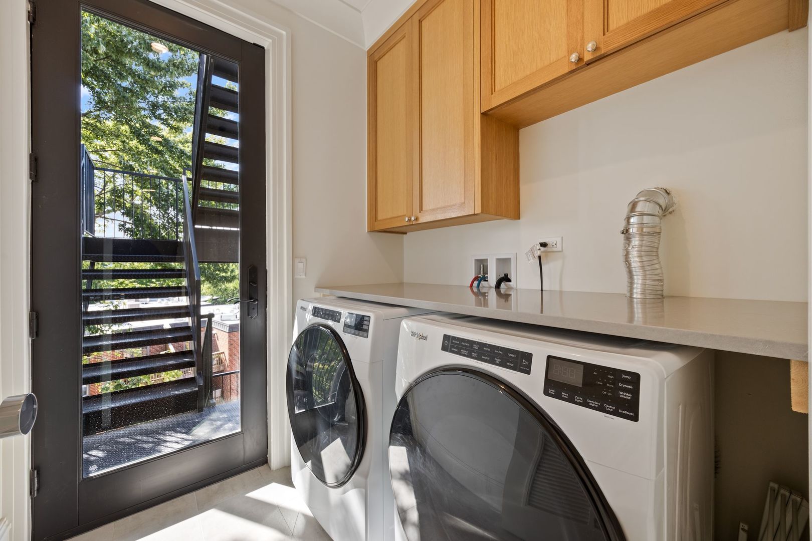 2034 North Mohawk Street, Unit 3 Chicago, IL 60614 - Photo 38 of 46 a utility room with dryer and washer