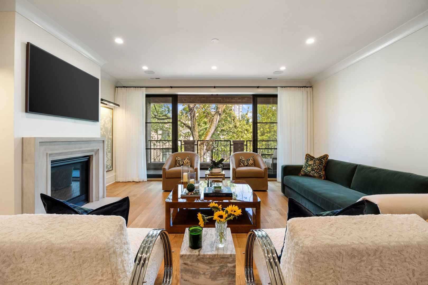 2034 North Mohawk Street, Unit 3 Chicago, IL 60614 - Photo 7 of 46 a living room with furniture fireplace and flat screen tv