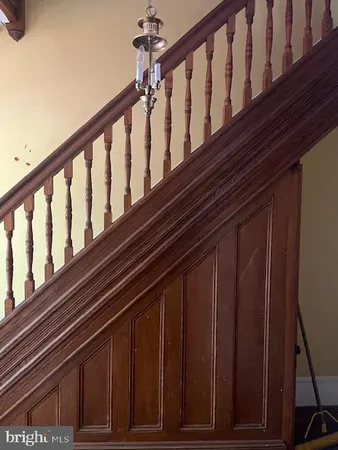 a view of fireplace with wooden floor