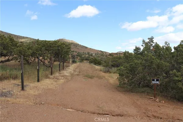 a view of a lake with mountains in the background