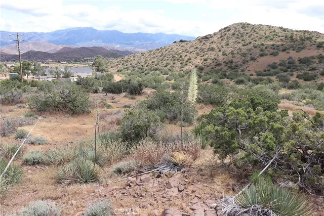 a view of mountains and valleys